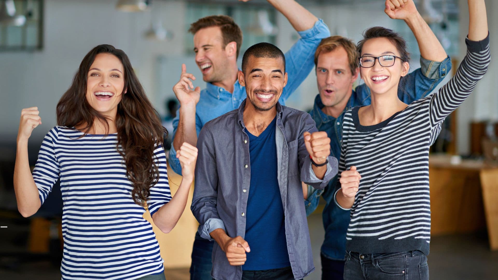 GTM Talent laughing and celebrating in a SaaS team